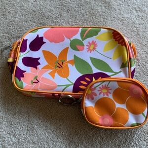 Set 2 Clinique cosmetic pouches.